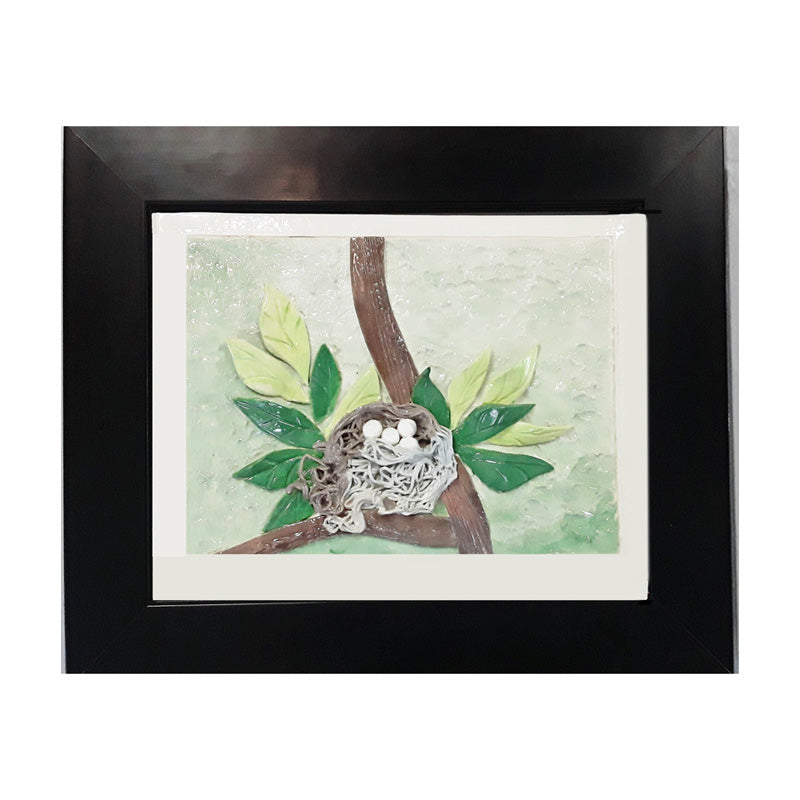 Nest with 4 Eggs in Bough of a Tree